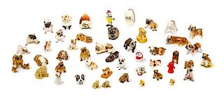 * A Group of Sixty-Four Bulldog Figures Width of widest 7 inches.
