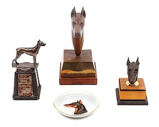 * A Group of Four Doberman Articles Height of tallest 8 1/4 inches.
