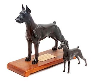 * Two Doberman Figures Height of taller 15 1/4 inches.