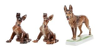 * A Group of Three Rosenthal Porcelain German Shepherds Width of widest 8 1/2 inches.
