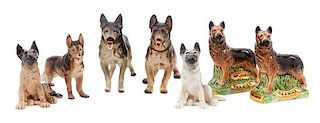 * A Group of Eight Porcelain German Shepherds Width of widest 9 1/4 inches.