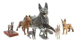 * A Group of Seven Metal German Shepherd Figures Width of widest 19 3/4 inches.