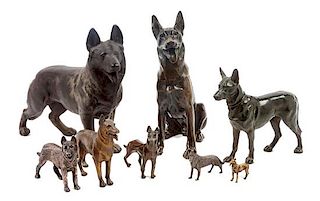 * A Group of Eight Bronze and Metal German Shepherds Width of widest 12 inches.