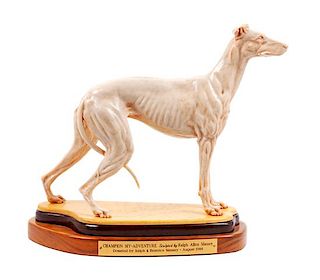 * A Resin Greyhound Sculpture Height 15 1/4 x width 19 x depth 6 1/2 inches.