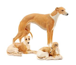 * A Group of Three Ceramic Greyhounds Width of widest 9 1/2 inches.