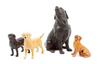 * A Group of Four Labrador Retriever Figures Height of tallest 10 1/2 inches.