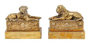 * A Pair of Brass Mastiff Chenets Width 11 1/2 inches.
