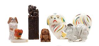 * A Group of Six Pekingese Figures Width of widest 9 1/2 inches.