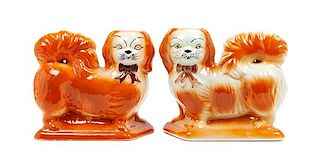 * A Pair of Staffordshire Pekingese Figures Width 8 1/2 inches.