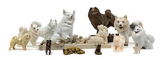 * A Group of Thirteen Samoyed Figures Width of widest 9 1/8 inches.
