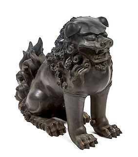 * A Bronze Chinese Foo Dog Height 15 1/4 inches.