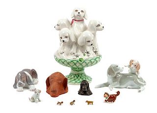 * A Group of Eleven Hound Figures and Articles Height of tallest 11 inches.