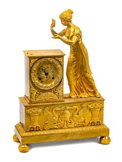 * A French Empire Style Gilt Bronze Mantel Clock Height 15 1/2 inches.