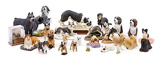 * A Group of Twenty-Six Dog Figures of Various Breeds Width of widest 9 inches.