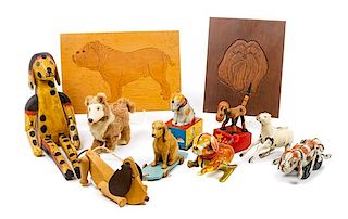 * A Group of Eleven Dog Toys depicting Various Breeds Width of widest 10 3/4 inches.