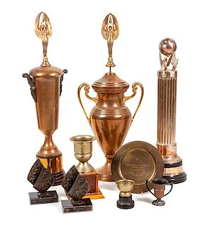 * A Group of Nine Trophies for Various Dog Breeds Height of tallest 39 inches.