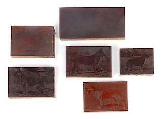 * A Collection of Copper Photogravure Plates Mounted on Wood Blocks