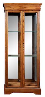* Three Wood and Glass Cases Height 79 inches.