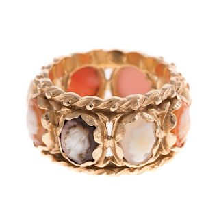 A Ladies Carved Cameo Eternity Band in 14K