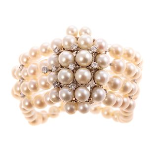 A Ladies 4 Strand Pearl & Diamond Bracelet in 14K