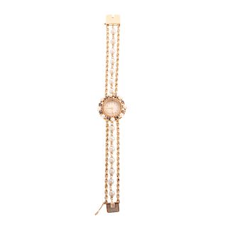 A Ladies Pearl & Sapphire Watch in 14K