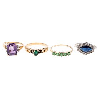 A Collection of 4 Gemstone Rings in Gold