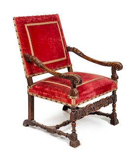 A Louis XIII Walnut Armchair Height 40 inches.