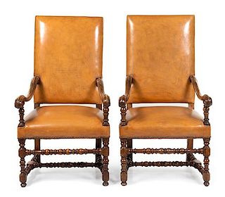 A Pair of Louis XIV Walnut Armchairs Height 48 inches.