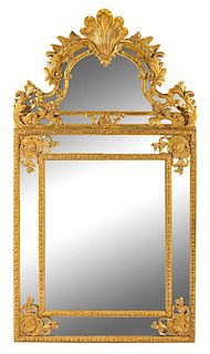A Regence Giltwood Mirror Height 66 x width 36 inches.
