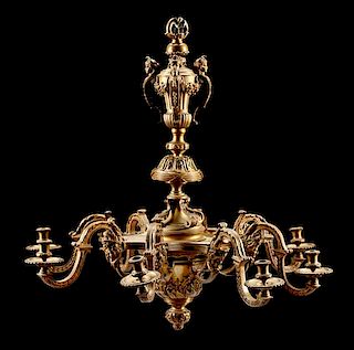 A Regence Style Gilt Bronze Eight-Light Chandelier Height 34 x diameter 33 1/2 inches.