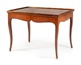 A Louis XV Style Parquetry Lift-Top Game Table Height 27 x width 36 1/2 x depth 26 1/2 inches.
