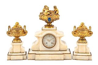 A French Gilt Bronze and Marble Clock Garniture Height of mantel clock 21 inches.