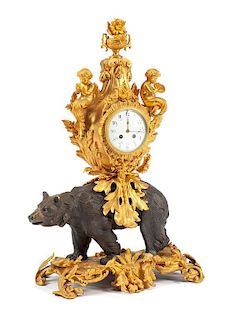 A Louis XV Style Gilt and Patinated Bronze Figural Clock Height 29 1/4 inches.