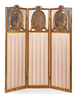 A Louis XVI Giltwood Three-Fold Dressing Screen Height 68 x width of each panel 18 5/8 inches.