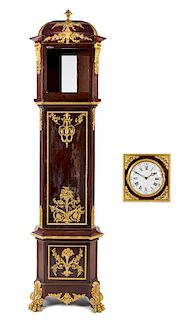 A Louis XVI Style Gilt Bronze Mounted Mahogany Tall Case Clock Height 105 x width 24 1/2 x depth 11 1/2 inches.
