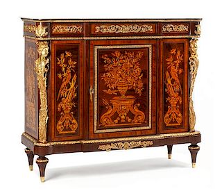 A Louis XVI Style Gilt Bronze Mounted Marquetry Cabinet Height 46 1/2 x width 54 x depth 19 1/2 inches.