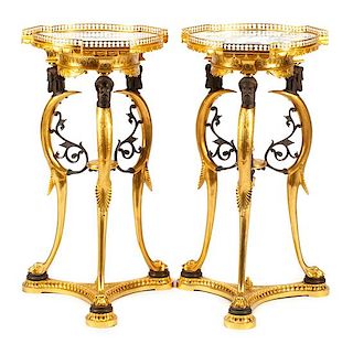 A Pair of Empire Style Gilt, Patinated Bronze and Marble Tables Height 32 x diameter of top 16 inches.
