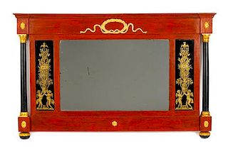 A Parcel Gilt and Ebonized Mirror Height 34 1/2 x width 55 1/2 inches.