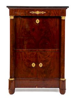 An Empire Gilt Bronze Mounted Mahogany Secretaire a Abattant Height 55 1/2 x width 38 1/2 x depth 17 5/8 inches.