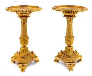 A Pair of Charles II Gilt Bronze Stands Height 12 3/8 x diameter 7 5/8 inches.