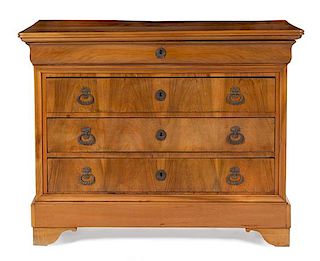 A Louis Philippe Walnut Commode Height 39 x width 51 x depth 22 inches.