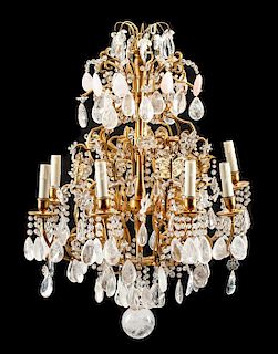 A French Gilt Bronze and Rock Crystal Eight-Light Chandelier Height 34 x diameter 23 inches.