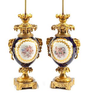 A Pair of Gilt Bronze Mounted Sevres Style Porcelain Vases Height overall 29 1/4 inches.