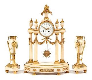 A French Gilt Bronze and Marble Clock Garniture
