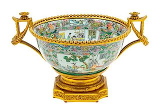 A Gilt Bronze Mounted Famille Verte Porcelain Punch Bowl Height 10 1/2 x width 17 1/2 inches.