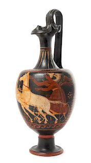 * An Apulian Red Figured Pottery Oinochoe Height 16 inches.
