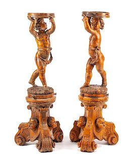 A Pair of Italian Carved Figural Stands Height 50 1/2 inches.