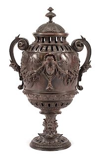 A Grand Tour Patinated Bronze Urn and Cover Height 25 1/2 inches.