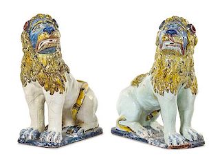 A Pair of Faience Models of Lions Height 29 3/4 x width 10 3/4 x depth 24 inches.