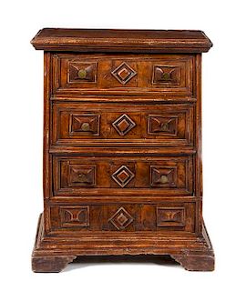 An Italian Walnut Chest of Drawers Height 34 x width 27 x depth 13 inches.